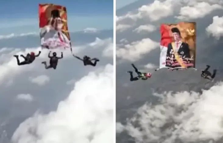Penerjun Payung Polri Kibarkan Bendera Jokowi-Prabowo dalam area Langit Mako Brimob Depok